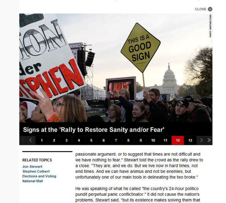 Published photo gallery showing the Good Sign in the rally crowd